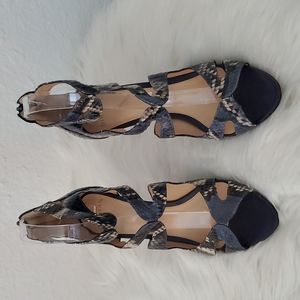 Alexandre Birman blue snakeskin heeled sandals.